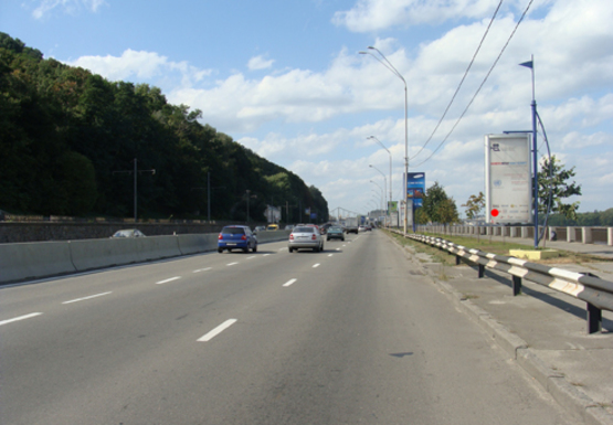 Фото рекламной плоскости по адресу Набережное шоссе (эл. опора № 32-33)