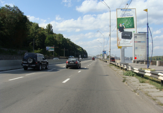 Фото рекламной плоскости по адресу Набережное шоссе (эл. опора № 34-35)