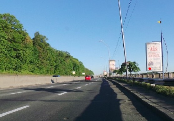 Фото рекламной плоскости по адресу Набережное шоссе (эл. опора № 40)