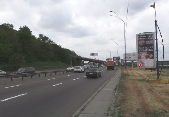 Фото рекламной плоскости по адресу Набережное шоссе (эл. опора № 84-85)