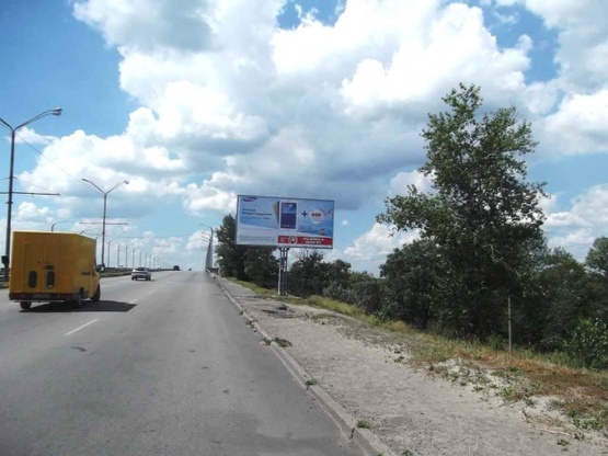 Фото рекламной плоскости по адресу Донецкое шоссе (перед Кайдакским мостом), в сторону центра города