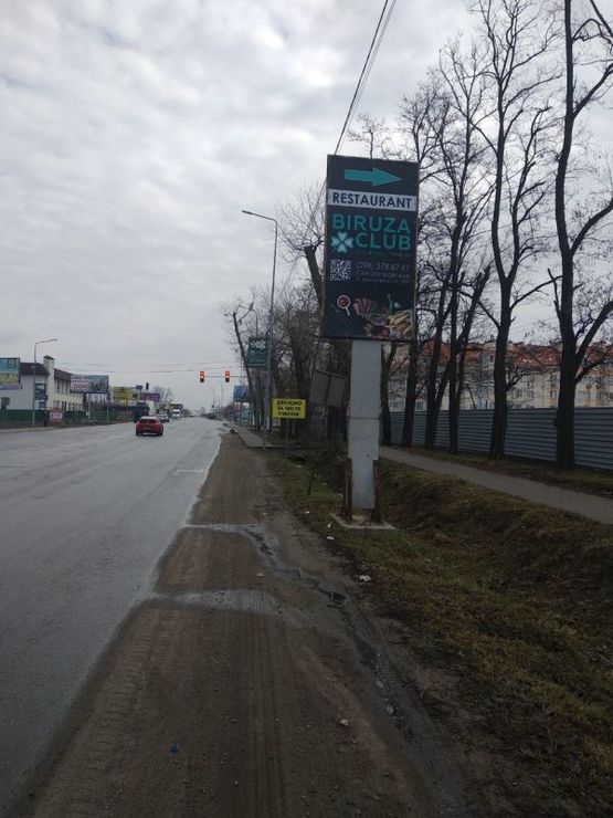 Фото рекламной плоскости по адресу c. Петрівське, траса  Київ-Бишів, Друга від Києва, вул.  Соборна, світлофор, поворот на  вул. Хмельницьку