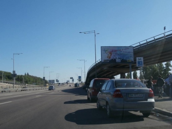 Фото рекламной плоскости по адресу Надднепрянское шоссе, М"Выдубичи" (по ходу к мосту Патона)