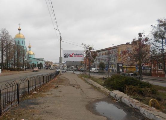 Фото рекламной плоскости по адресу (ул.Радянская) вул. Небесної сотні , 14, на развилке с(ул.Рафаила Черного) вул. Гайдамацька (базар возле швейной фабрики), сторона Б