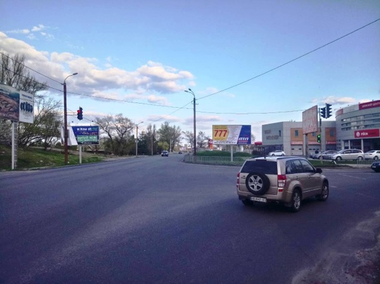 Фото рекламної площини за адресою Набережная Победы ул., - Добровольцев ул. (АЗС "Юкон", спорт-бар "Beer winner"), в направл. Южного моста