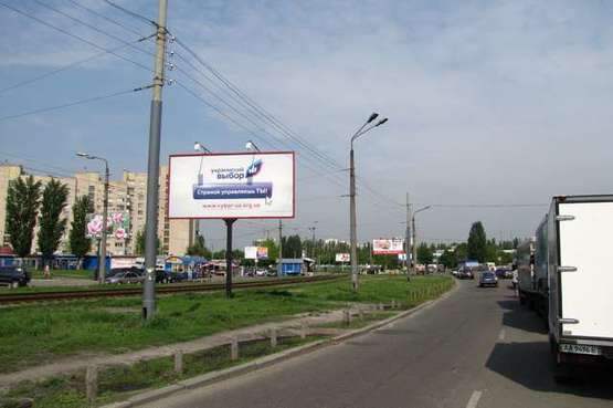 Фото рекламної площини за адресою Симиренка вул., 2;100м до повороту на Жолудєва вул.; навпроти універсаму (в напр. Кольцова бульв.)