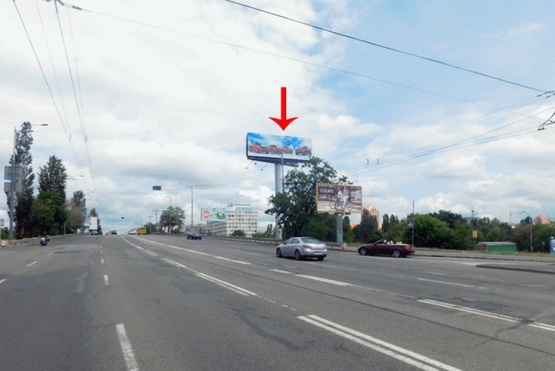 Фото рекламной плоскости по адресу Воссоединения пр-т, развязка с ул.Березняковской, со стороны моста Патона