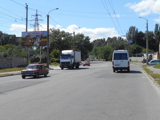 Фото рекламної площини за адресою Гальченко.35 - Прессовая ул., (перекресток, АЗС "Юкон"), в направл. ул. Богдана Хмельницкого