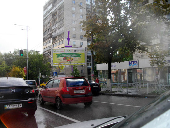 Фото рекламної площини за адресою ул. Урицкого, 25 / ул. Стадионная(на светофоре)