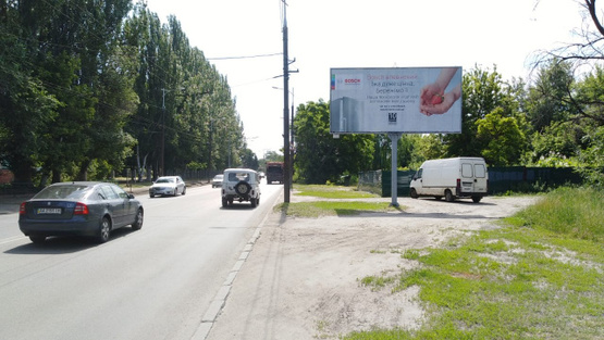 Фото рекламної площини за адресою Мануйловский просп. (Воронцова просп.), возле дома №25 (Детская больница, Роддом), в направл. просп. газеты "Правда"