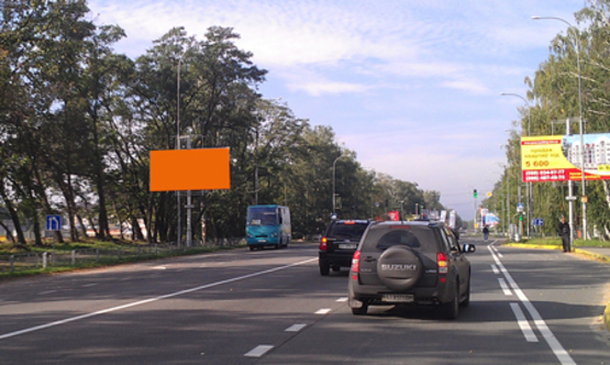 Фото рекламной плоскости по адресу ул. Новое шоссе, направление из Киева, рядом с ТЦ Модуль, на остановке