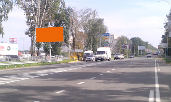 Фото рекламной плоскости по адресу ул. Новое шоссе , направление на Киев, рядом с ТЦ Модуль, на остановке