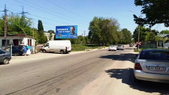 Фото рекламной плоскости по адресу Шинная ул., 10, (СТО "Тандем", "Таврия", АЗС "Смайл", шиномонтаж), в направл. Запорожского шоссе