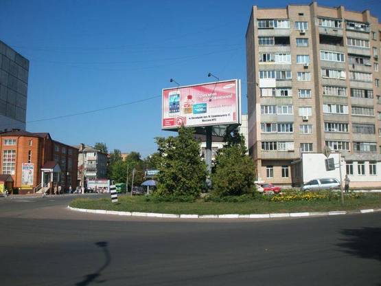 Фото рекламной плоскости по адресу ул. Декабристов 1-А, перекресток с ул.Грушевского , клумба, со стороны ул.Грушевского