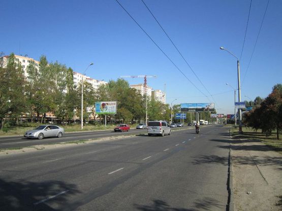 Фото рекламной плоскости по адресу просп. Маршала Жукова, 91-А (возле автостоянки № 3)