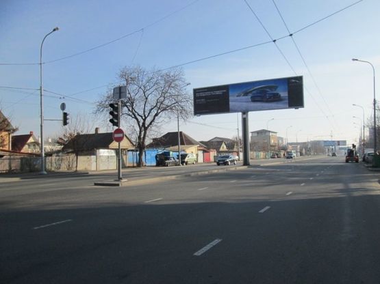 Фото рекламной плоскости по адресу ул. Щорса - ул. Корнюшина (правая в город)