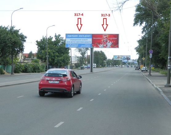 Фото рекламной плоскости по адресу ул. Щорса, 109 (на разделителе от ТЦ Аэропортовский) (правая)