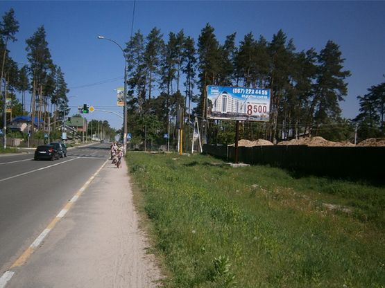 Фото рекламной плоскости по адресу На перекрестке ул. Университетская и ул. Пушкинская (по Ирпенской трассе направление из Киева)