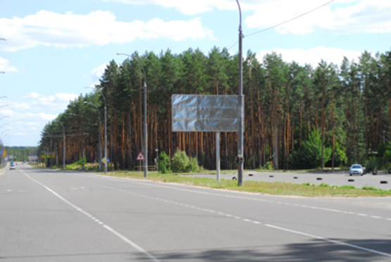 Фото рекламной плоскости по адресу ул. Университетская, возле кладбища (по Ирпенской трассе направление на Киев)