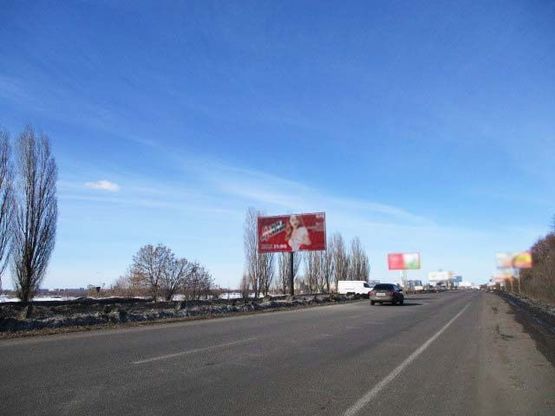 Фото рекламной плоскости по адресу Московский пр. - пов. на Б.Рогань (Ростовская трасса - поворот на Б.Рогань) разделитель въезд в Харьков (200 м. к АЗС "ОККО")