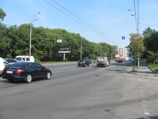 Фото рекламной плоскости по адресу Лобановского Валерия просп. (Краснозвездный просп.), 130 (АЗС "ANP", автомагазан АТЛ, салон "Панські примхи", Совские пруды), в направ. Московской пл.
