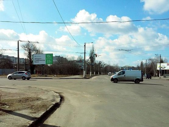 Фото рекламной плоскости по адресу Независимости пр., 124 (150 м Приват Банк, супермаркет Метро)