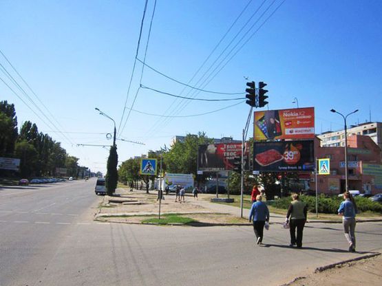 Фото рекламной плоскости по адресу Великого В. ул., 59 - Кустанаевская ул., ("Дом Мод"), направление к  Артема пл.