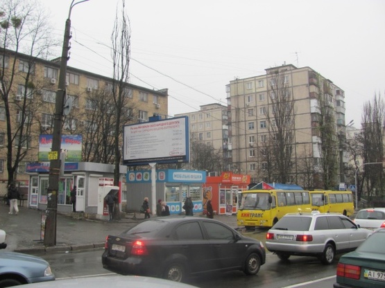 Фото рекламної площини за адресою Юры Гната ул., 9, (ТЦ "Квадрат", ТЦ "Дитяча країна", кинотеатр "Лейпциг", Ельдорадо, БЦ "Жизнь и Право", "Сильпо", "Велика кишеня), направ. прос. Л.Курбаса