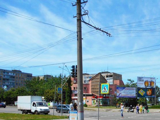 Фото рекламной плоскости по адресу Великого В. ул., 59 - Кустанаевская ул., ("Дом Мод"), направление от  Артема пл.