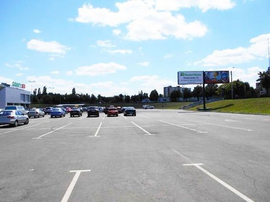 Фото рекламної площини за адресою 30 лет Победы пл., 1, стоянка Солнечная галерея, с\м "ОКЕЙ"