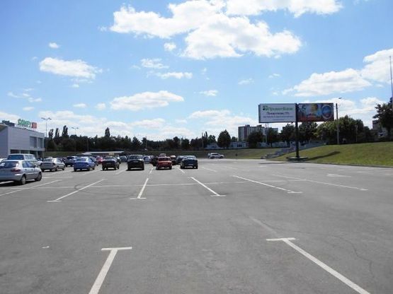 Фото рекламної площини за адресою 30 лет Победы пл., 1, стоянка Солнечная галерея, с\м "ОКЕЙ"