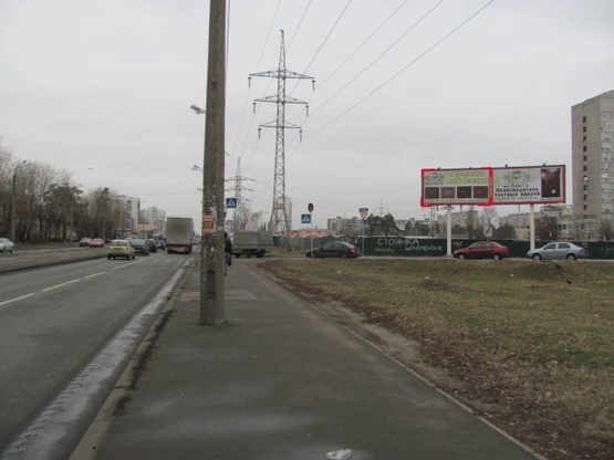Фото рекламної площини за адресою Хоткевича Гната ул. (Красногвардейская ул.), 2, (заправка ТНК, Супермаркет «NOVUS», KFC, переезд с просп. Ю.Гагарина на ул. Красногвардейскую)
