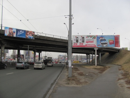 Фото рекламної площини за адресою Тульская пл., (АЗС "ТНК", ТЦ "Макрос" в сторону ул. О.Телиги), призма