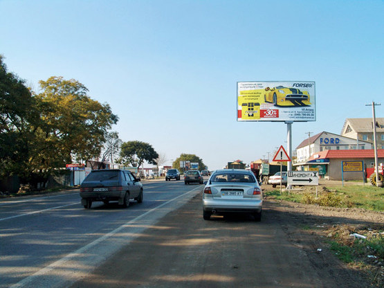 Фото рекламної площини за адресою Объездная дорога - Балтская дорога, с пос.Котовского к Усатово, Клеверному мосту