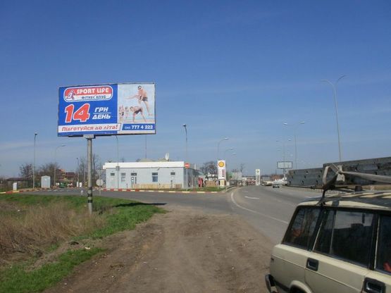 Фото рекламной плоскости по адресу Объездная дорога (АЗС "Shell") въезд на Клеверный мост, движение от 2х Столбов в сторону Киевской трассы, на пос. Котовского