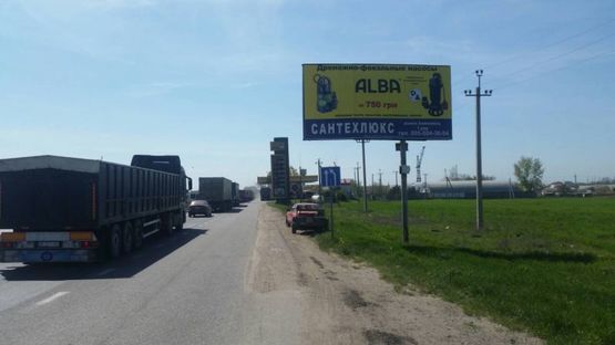 Фото рекламной плоскости по адресу Объездная дорога напротив (22+350) перед АЗС БРСМ, к развязке Два Столба, стройрынку Анжелика