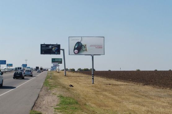 Фото рекламної площини за адресою Овидиопольская дорога - напротив промрынка "7км", от "Эпицентра" к ЖК "7-е Небо"