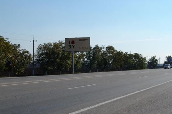 Фото рекламної площини за адресою Объездная дорога от развязки Два столба в сторону промрынка "7 км"