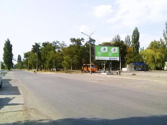 Фото рекламної площини за адресою Горняков ул., 38, мкр. Ингулец, (Автостиль, пиццерия "Челентано", автовокзал)