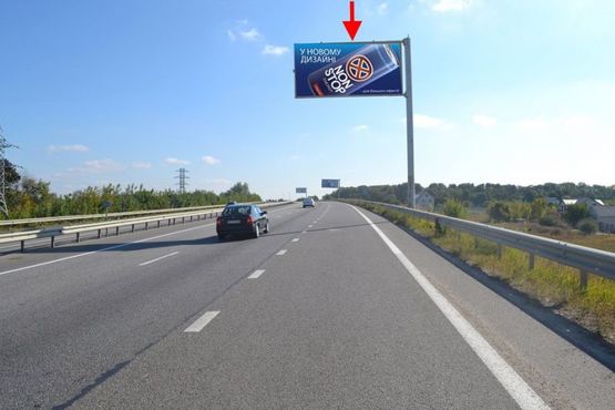 Фото рекламної площини за адресою Эстакада1-пос.Песочин-въезд в город со ст.трассы Киев-Харьков-Довжанский