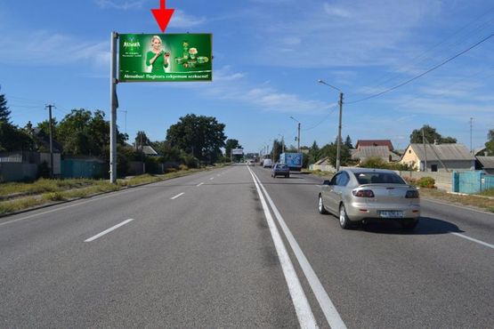 Фото рекламної площини за адресою Полтавский шлях-пос.Песочин-ул. Комарова-флажок№1,из центра