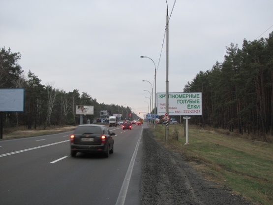 Фото рекламной плоскости по адресу Столичное шоссе/санаторий "Жовтень" выезд из города в сторону Обухова