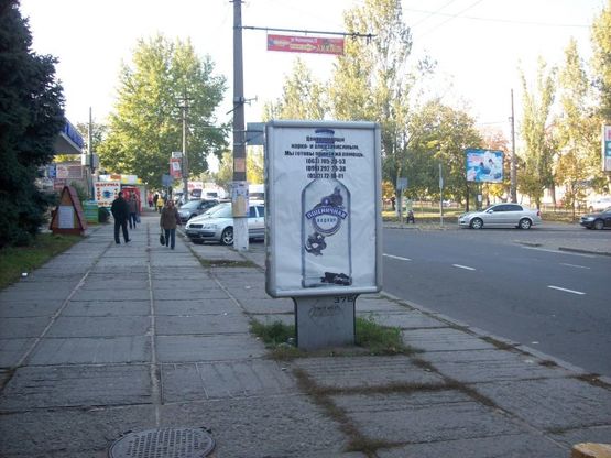 Фото рекламной плоскости по адресу пр. Леніна, 67 - вул. Фалєєвська