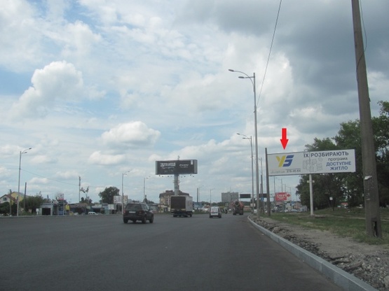 Фото рекламной плоскости по адресу Зодчих ул., 32, Кольцевая дорога (в направлении проспекта Победы,  Новая Почта,Ашан, Эльдорадо)
