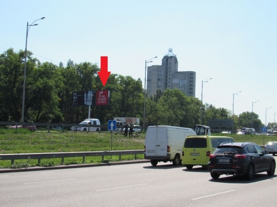 Фото рекламної площини за адресою Зодчих ул., 32, Кольцевая дорога (в направлении Новус, Види АвтоСити, АЗС ОККО)