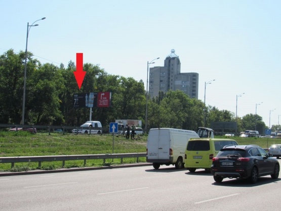 Фото рекламной плоскости по адресу Зодчих ул., 32, Кольцевая дорога (в направлении Новус, Види АвтоСити, АЗС ОККО)