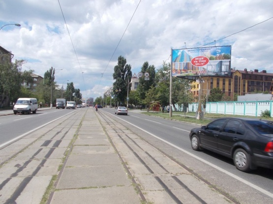 Фото рекламной плоскости по адресу Пражская ул., 12, (Парихмахеркая "Марафет",  АЗС "ОККО"),в направ. Дарницкой площади