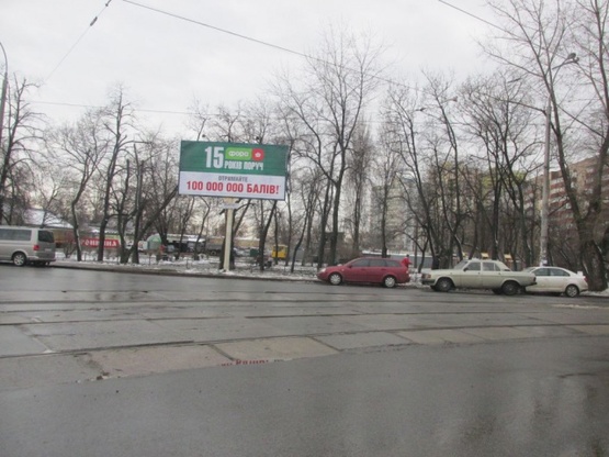 Фото рекламної площини за адресою Пражская ул./Алма-Атинская ул. (маркет "Фора", "Еко-маркет", ОщадБанк, аптека"Валедус"), направ. в центр