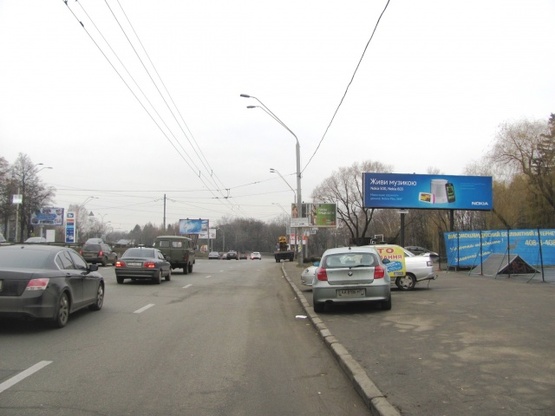 Фото рекламной плоскости по адресу Победы просп. (ст. м.  Берестейская, KIA motors, Музей мастерская, УкрСибБанк),направ. из города, бэклайт