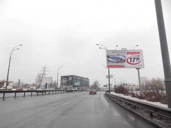 Фото рекламной плоскости по адресу Набережно-Рыбальская, напротив АЗС, напр. к Оболони
